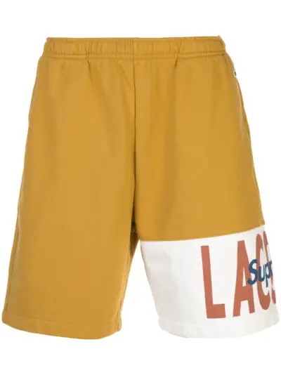 Supreme x Lacoste logo-panel track shorts - Gold
