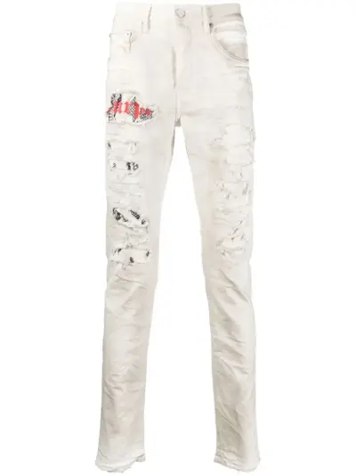Purple Brand paint-splatter tapered jeans - White