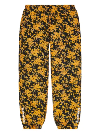 Supreme floral-pattern track pants - Black